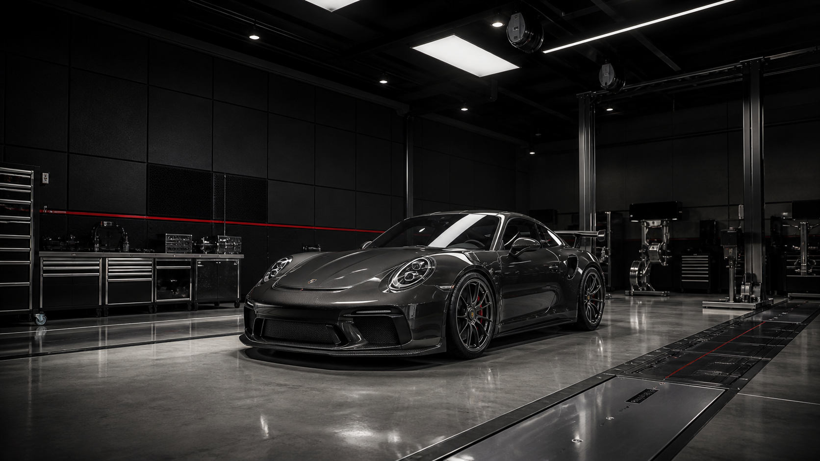 Porsche grafite em oficina automotiva premium